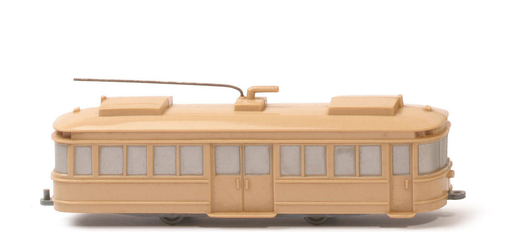 Straßenbahn 2-Achs-Triebwagen uv - beige, mit Kupplung, Stromabnehmer als Stange - 680/3a